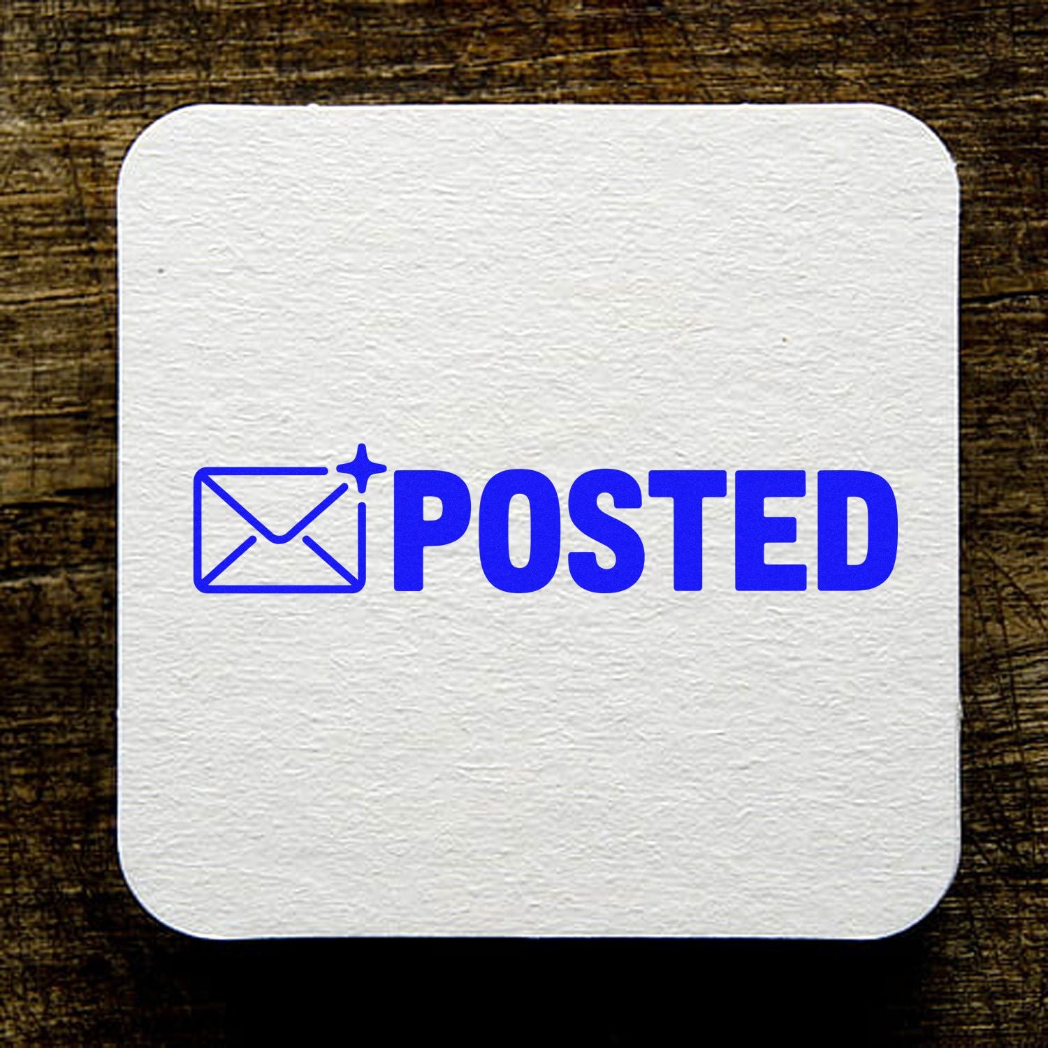 Blue Posted rubber stamp design with envelope icon for mail, shipping, and office document marking.