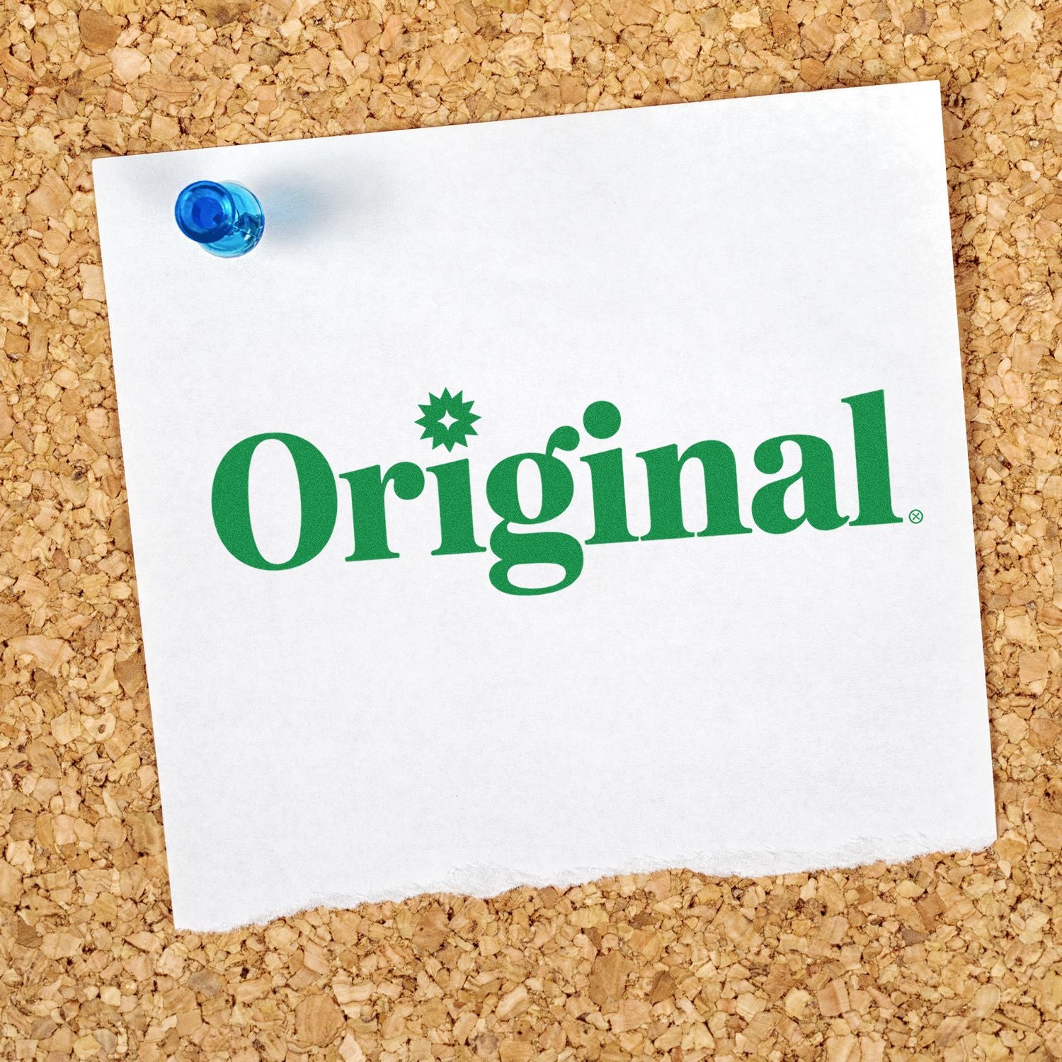 Original rubber stamp logo on pinned note, ideal for custom stationery, branding, and craft projects.