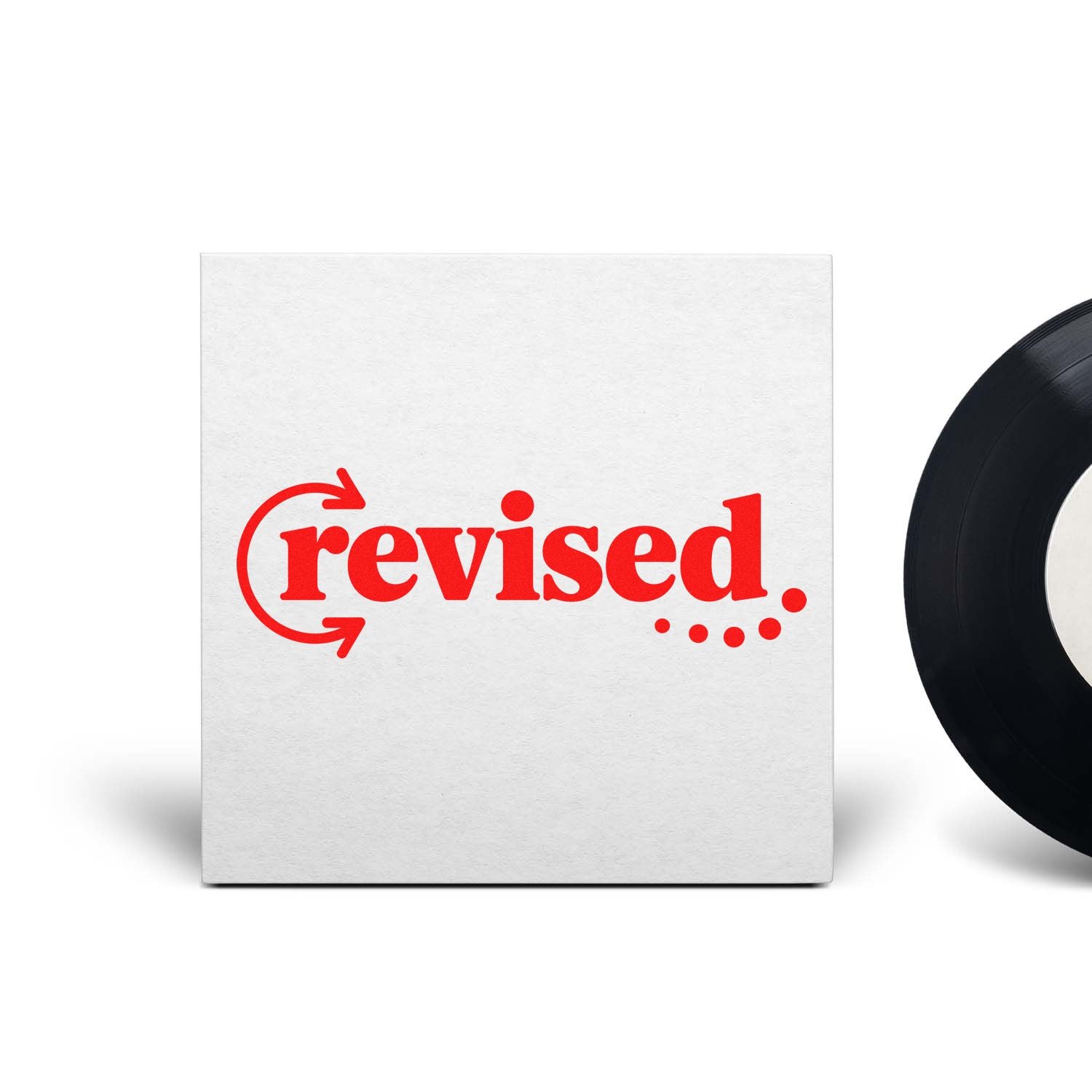 Revised rubber stamp design with red circular arrows for marking edited documents or proofs.