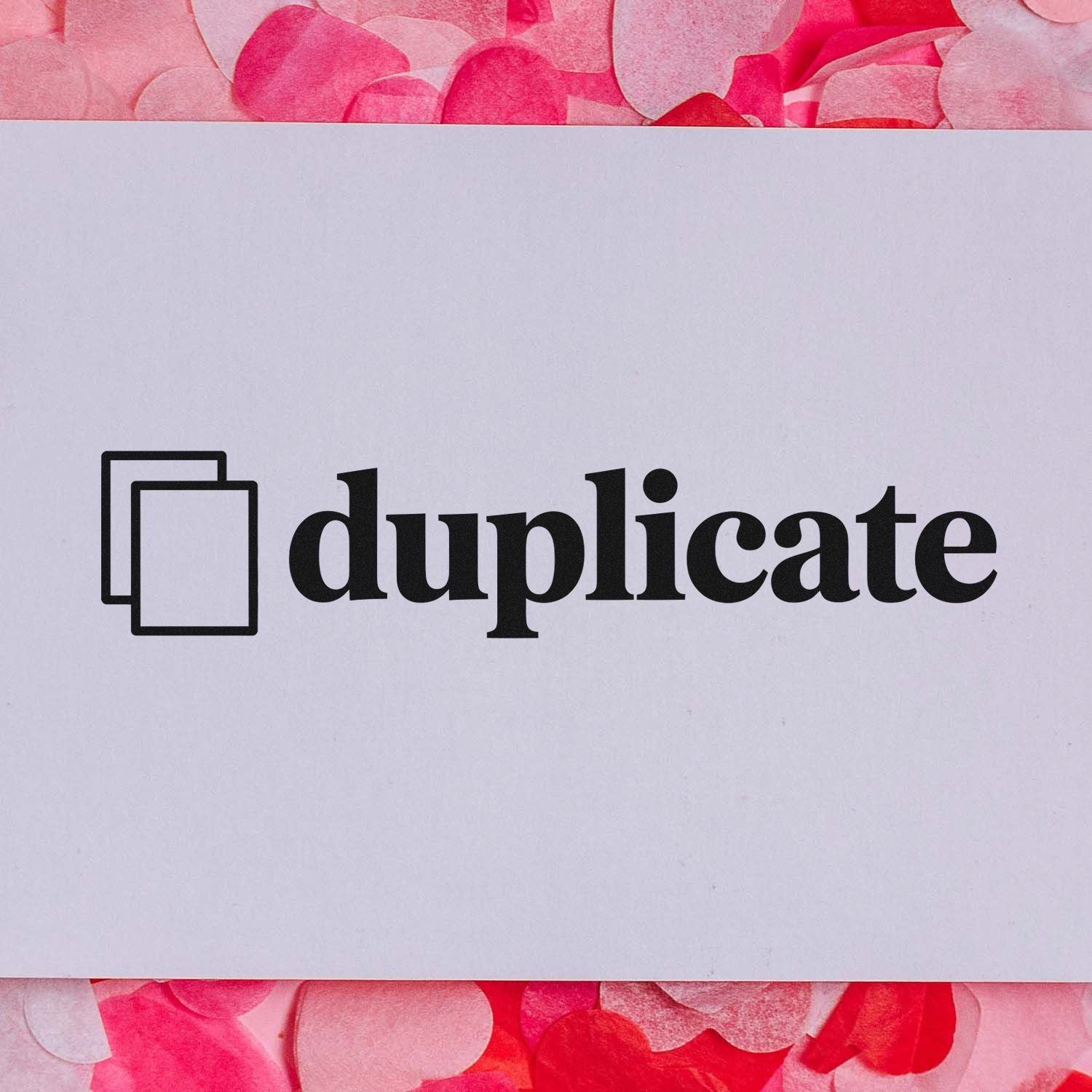 Duplicate rubber stamp design with copy icon, used to mark documents as duplicates on white paper.