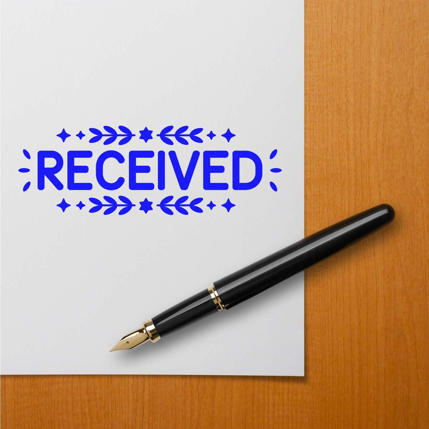 Blue RECEIVED rubber stamp on paper with fountain pen, ideal for office mail and document processing.