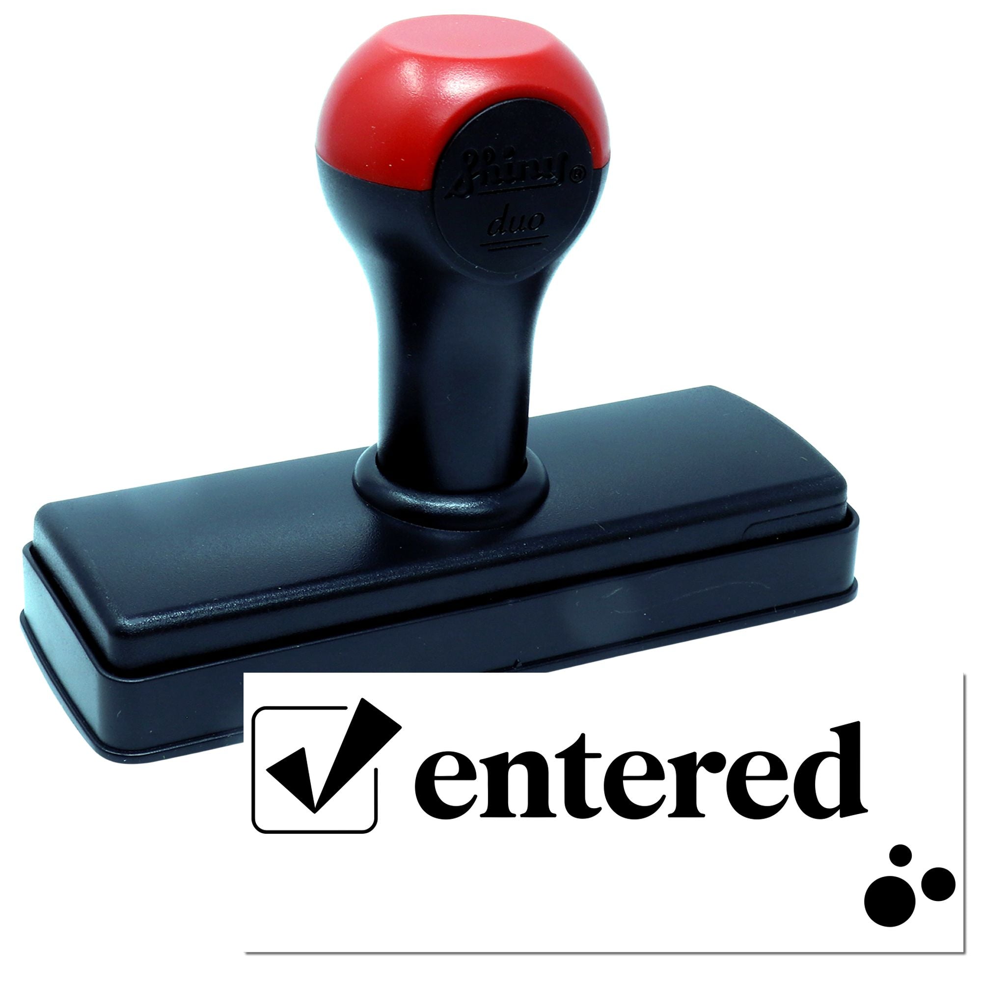 Self-inking rubber stamp with Entered imprint for office document processing, approval tracking, and record keeping.