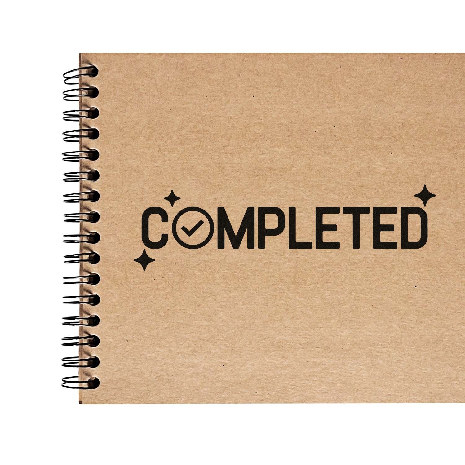 Completed rubber stamp on kraft spiral notebook cover, perfect for planners, journals, and task tracking.