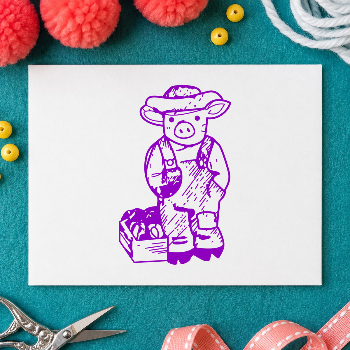 Farmer Pig with Produce Rubber Stamp impression in purple ink on white paper in a styled craft setting.