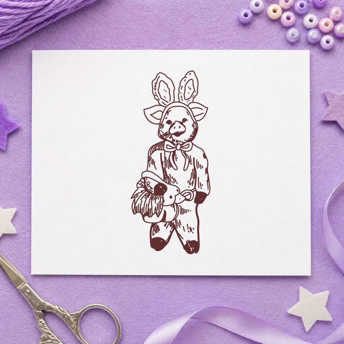 Pig in Bunny Costume with Basket Rubber Stamp impression in brown ink on white paper in a styled craft setting.