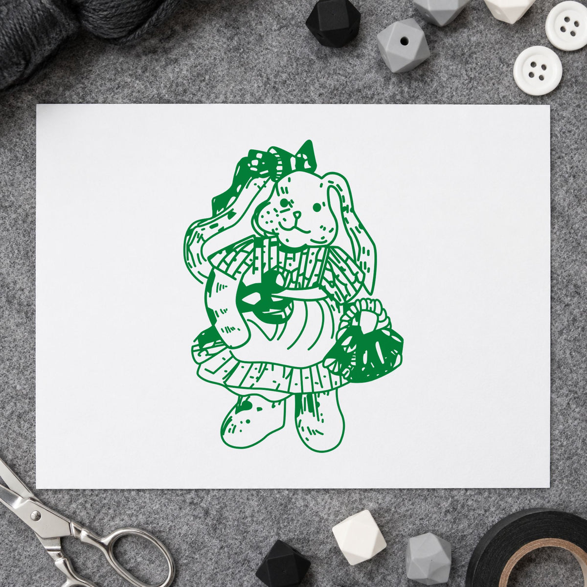 Country Bunny with Basket Rubber Stamp impression in green ink on white paper in a styled craft setting.