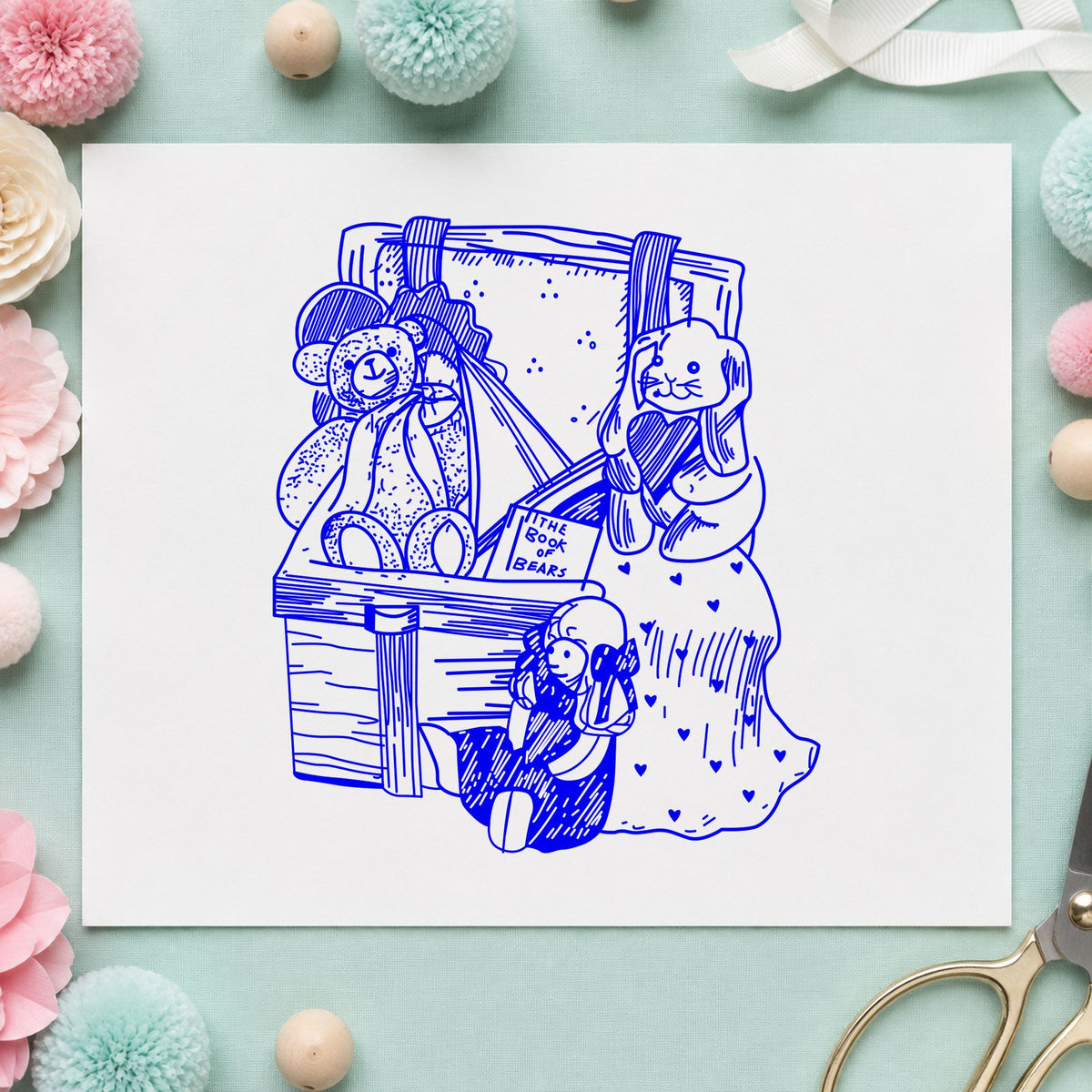 Blue nursery rubber stamp impression featuring the toy box with bear and bunny design on white paper.