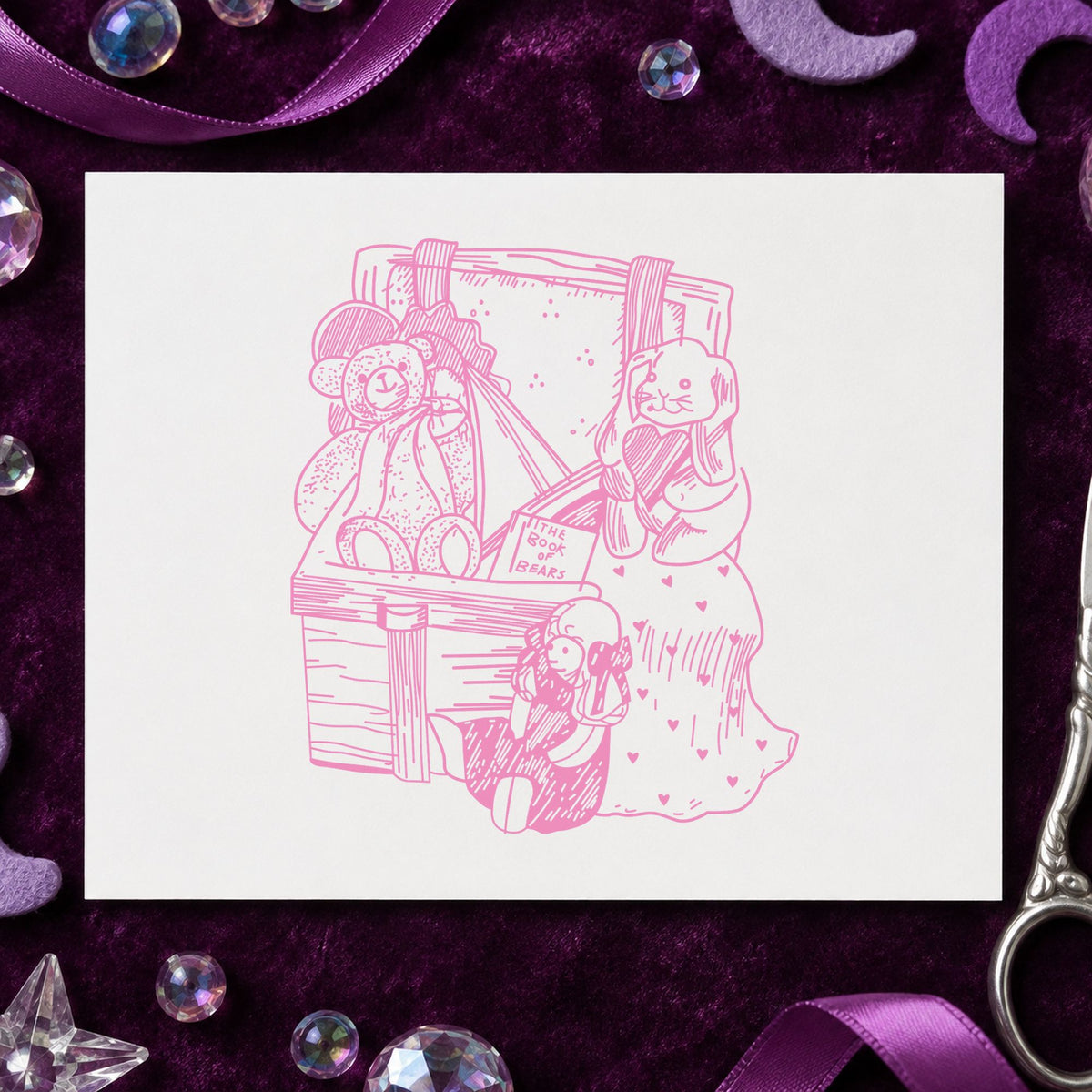 Toy Box with Bear and Bunny Rubber Stamp impression in pink ink on white paper in a styled craft setting.