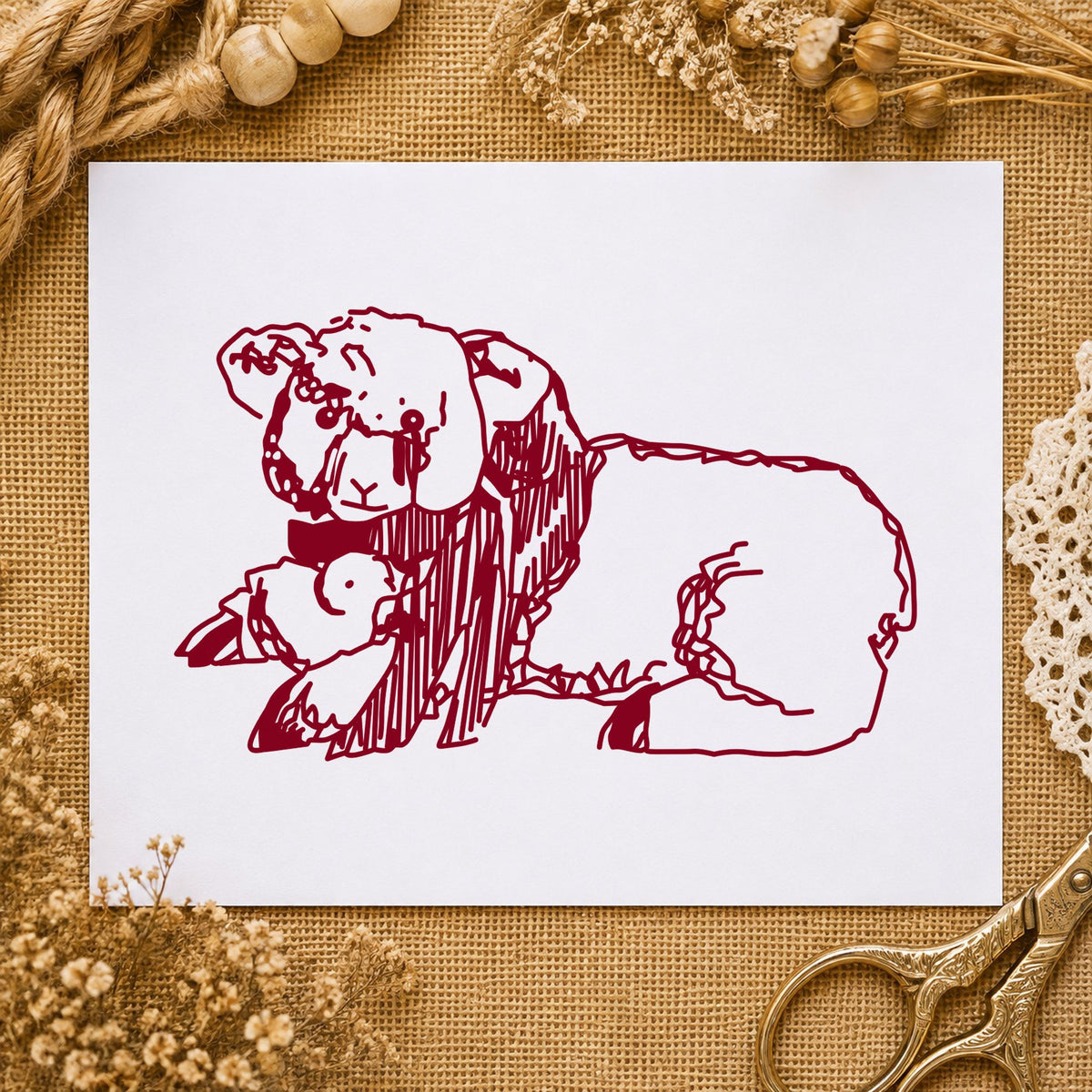 Lamb and Chicken Rubber Stamp impression in burgundy ink on white paper in a styled craft setting.