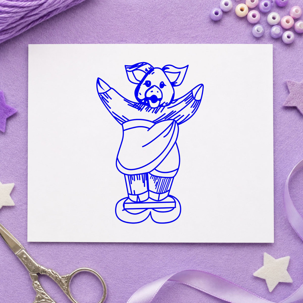Pig on Bathroom Scales Rubber Stamp impression in blue ink on white paper in a styled craft setting.