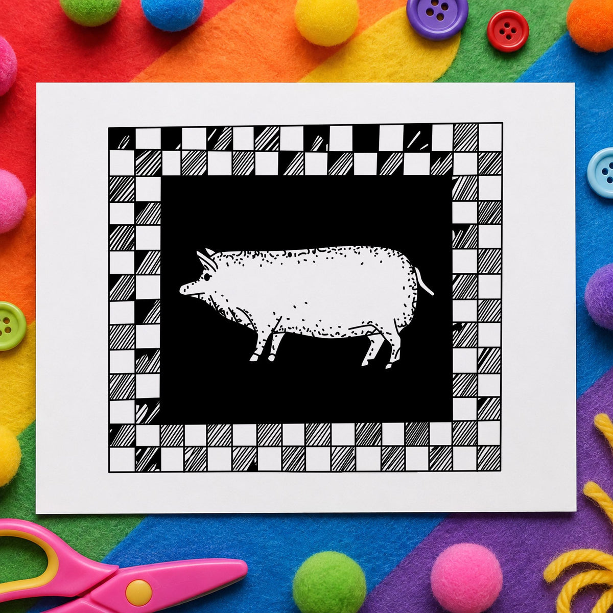 Pig with Checkered Border Rubber Stamp impression in black ink on white paper in a styled craft setting.