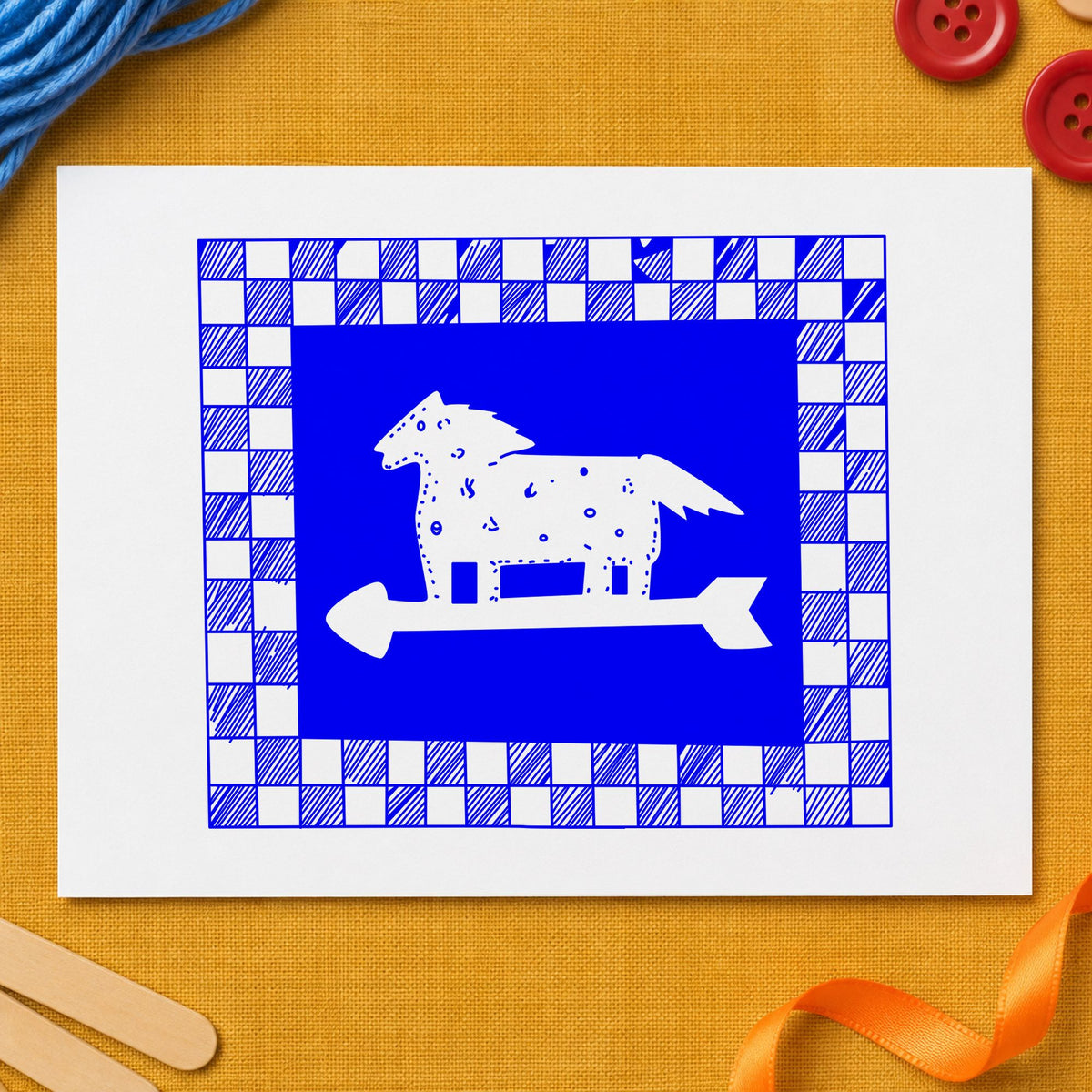 Horse Weathervane Rubber Stamp Checkered Border impression in blue ink on white paper in a styled craft setting.