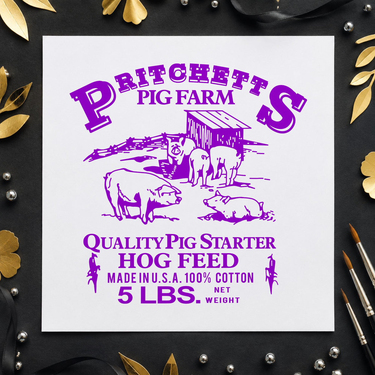 Hog Feed Label Rubber Stamp impression in purple ink on white paper in a styled craft setting.