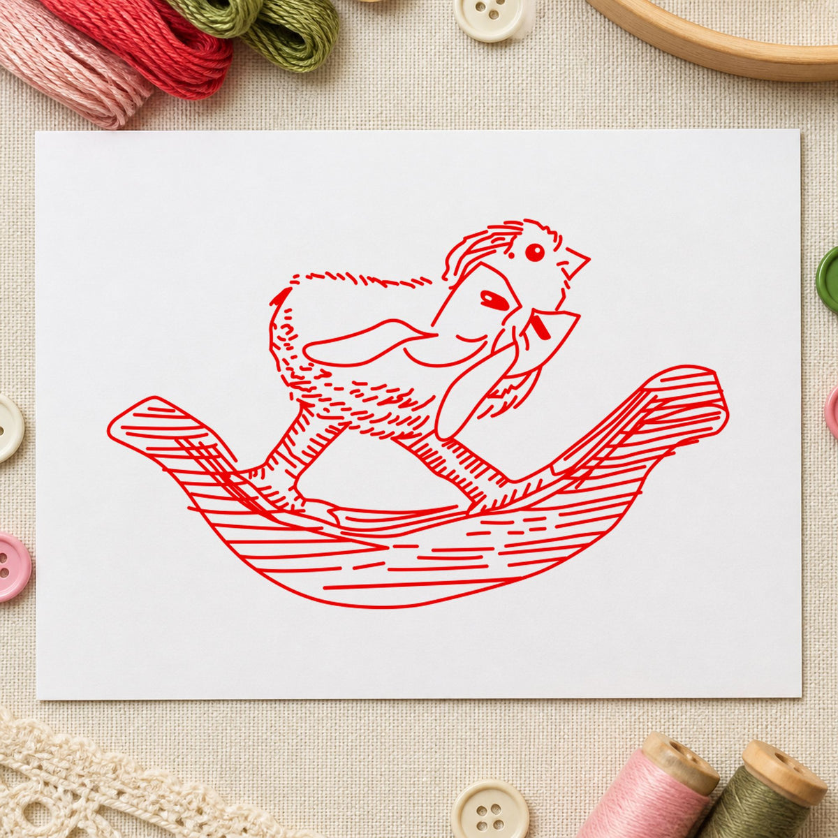 Rocking Chicken with Bow Rubber Stamp impression in red ink on white paper in a styled craft setting.