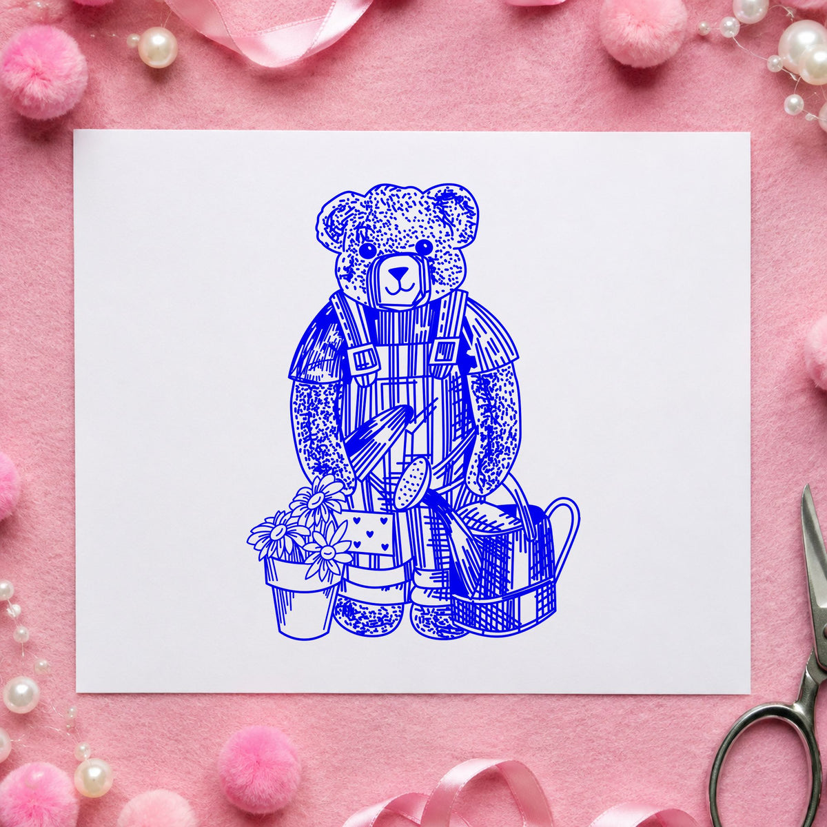 Blue nursery craft stamp impression featuring the teddy bear riding rocking horse design on white paper.