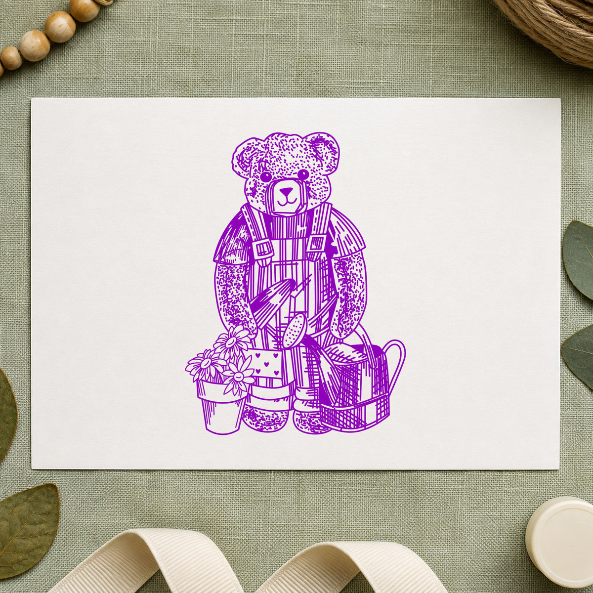 Teddy Bear Riding Rocking Horse Rubber Stamp impression in purple ink on white paper in a styled craft setting.