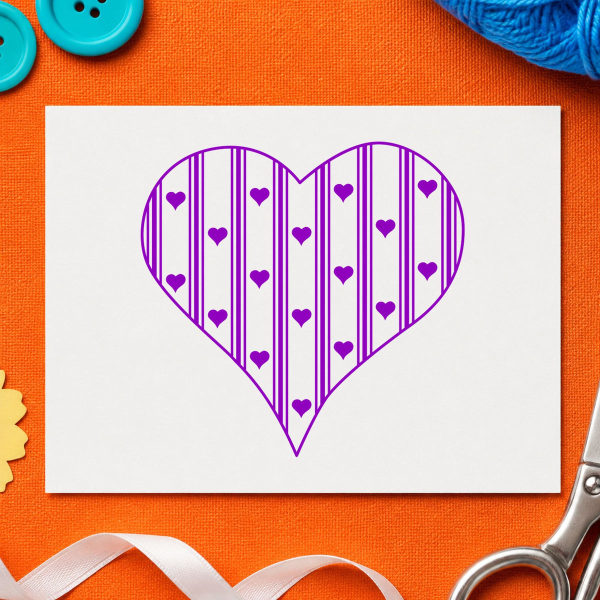 Striped Country Heart Rubber Stamp impression in purple ink on white paper in a styled craft setting.
