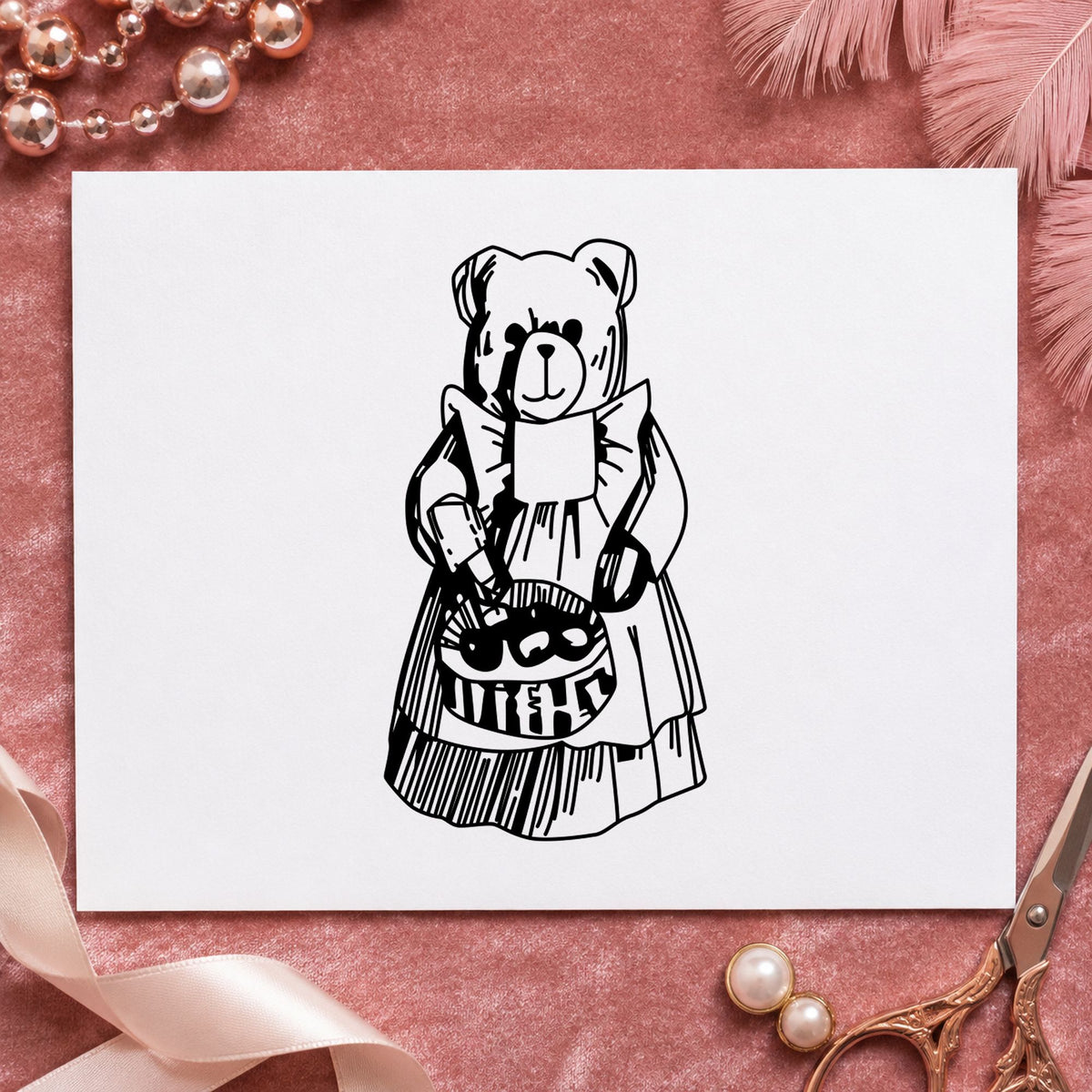 Country Bear with Produce Basket Rubber Stamp impression in black ink on white paper in a styled craft setting.