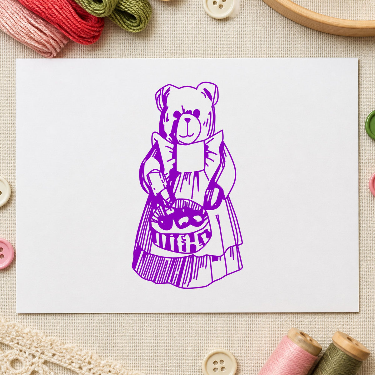 Country Bear with Produce Basket Rubber Stamp impression in purple ink on white paper in a styled craft setting.