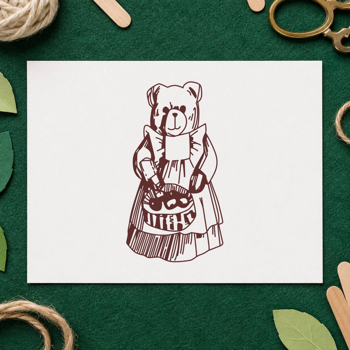 Country Bear with Produce Basket Rubber Stamp impression in brown ink on white paper in a styled craft setting.