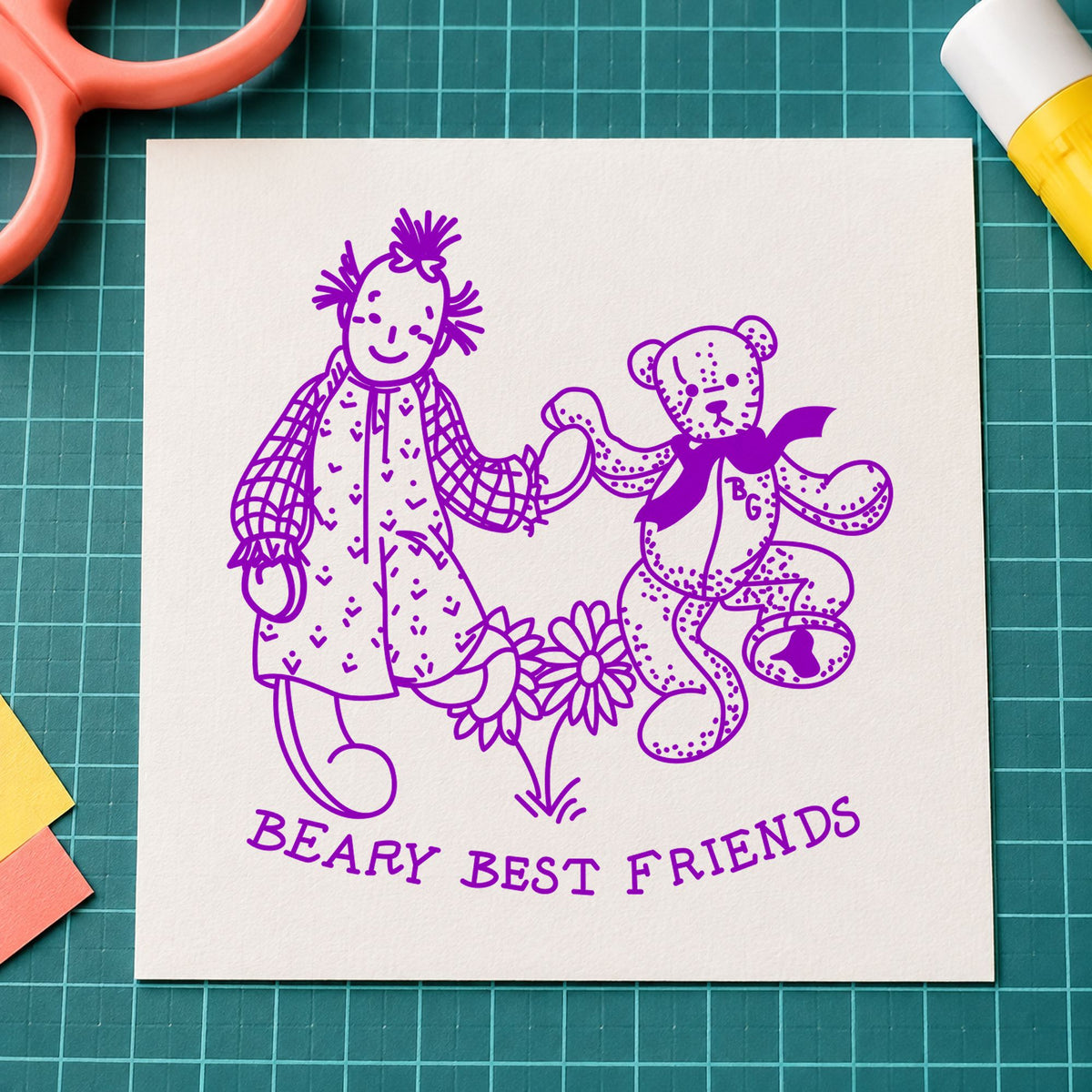 Beary Best Friends Bear and Doll Rubber Stamp impression in purple ink on white paper in a styled craft setting.