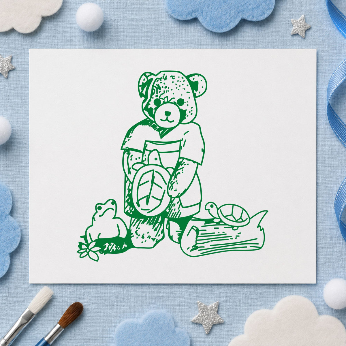 Bear with Turtles Rubber Stamp impression in green ink on white paper in a styled craft setting.