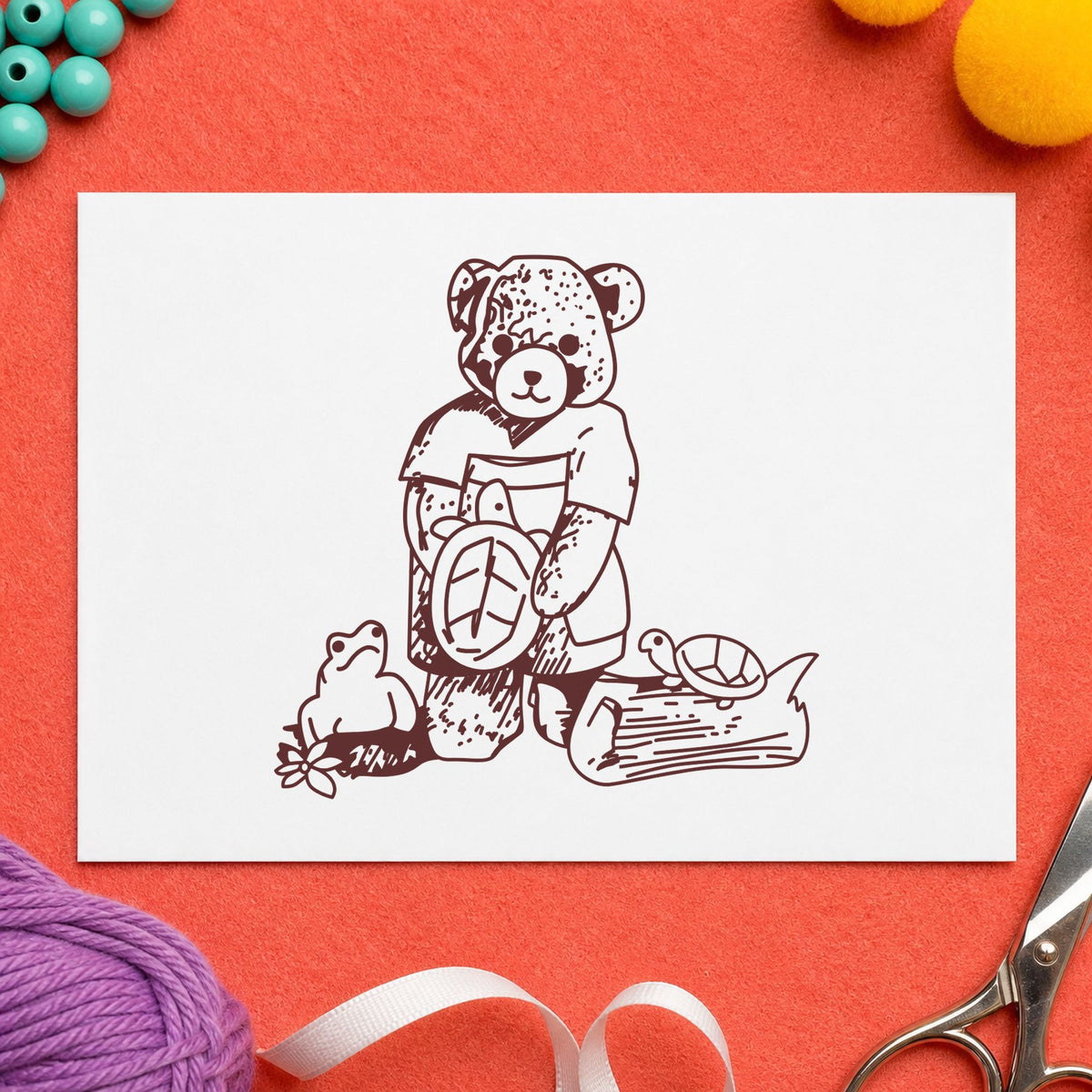 Bear with Turtles Rubber Stamp impression in brown ink on white paper in a styled craft setting.