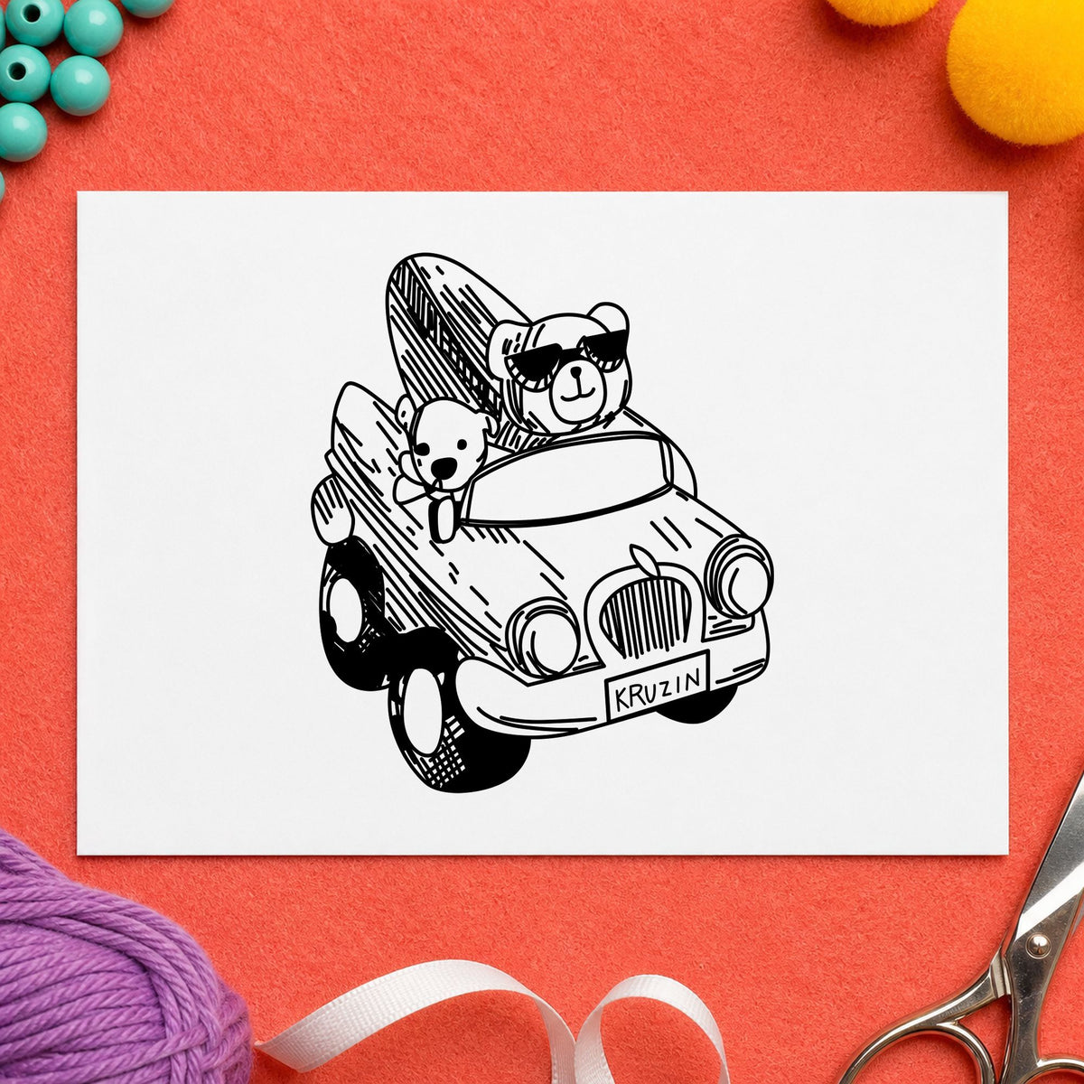 Surfboard Bear in Convertible Rubber Stamp impression in black ink on white paper in a styled craft setting.