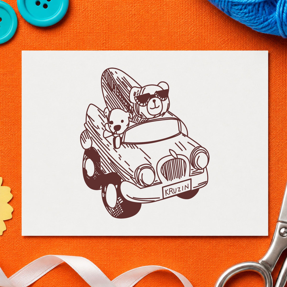 Surfboard Bear in Convertible Rubber Stamp impression in brown ink on white paper in a styled craft setting.