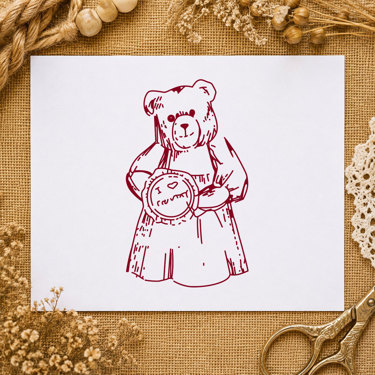 I Love Country Bear with Pie Rubber Stamp impression in burgundy ink on white paper in a styled craft setting.