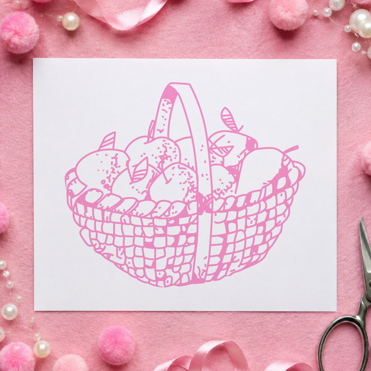 Round Apple Basket Rubber Stamp impression in pink ink on white paper in a styled craft setting.