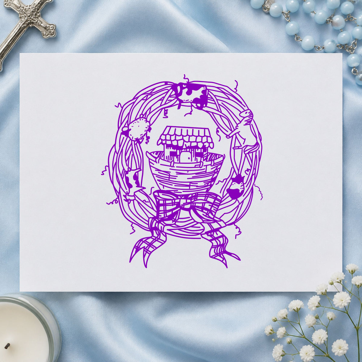 Ark in Wreath Rubber Stamp impression in purple ink on white paper in a styled craft setting.