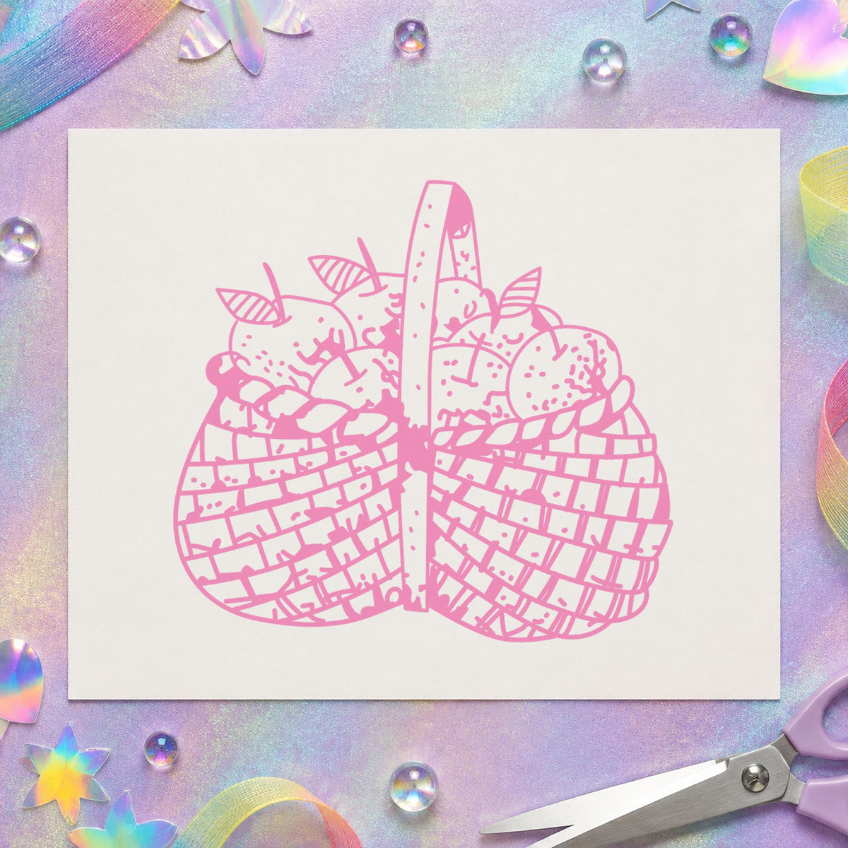 Basket Brimming with Apples Rubber Stamp impression in pink ink on white paper in a styled craft setting.