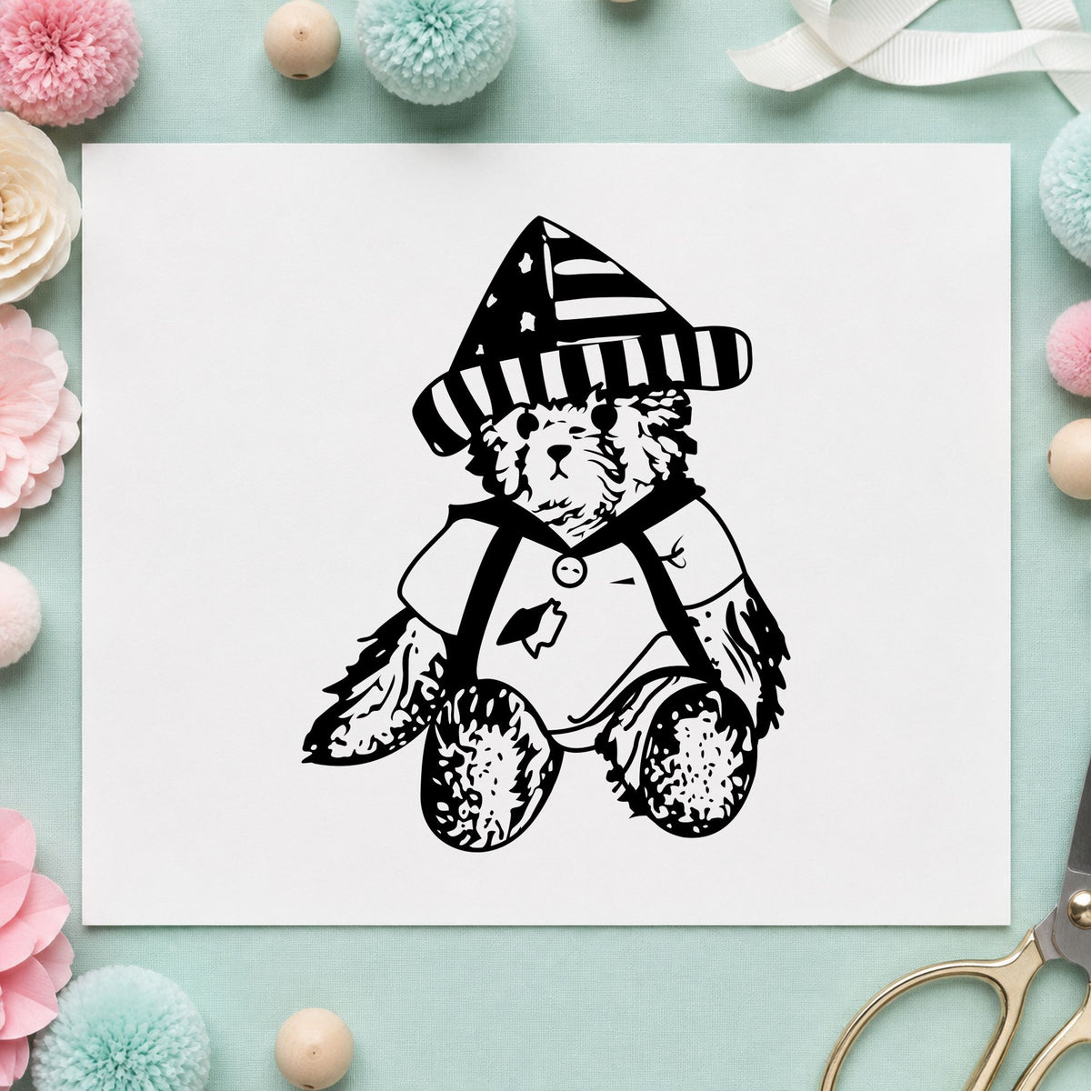 Black impression from a patriotic bear stamp, featuring the bear in stars and stripes hat design on white paper.
