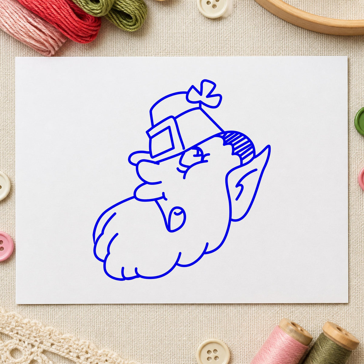 Blue irish craft stamp impression featuring the leprechaun head with shamrock hat design on white paper.