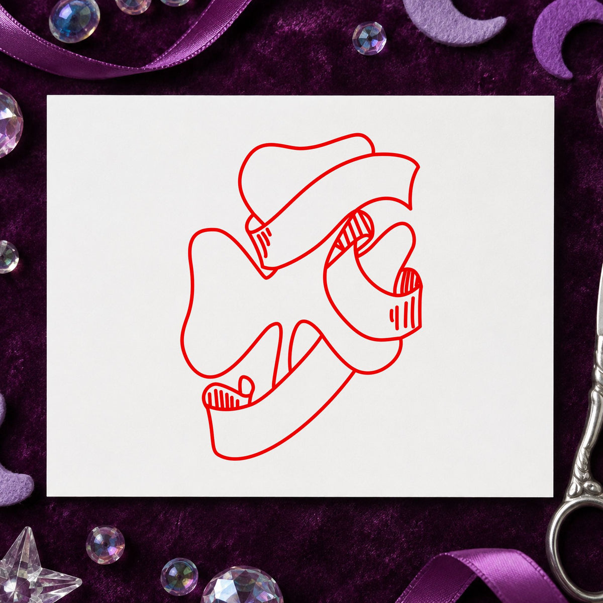 Shamrock with Leprechaun Hat Rubber Stamp impression in red ink on white paper in a styled craft setting.