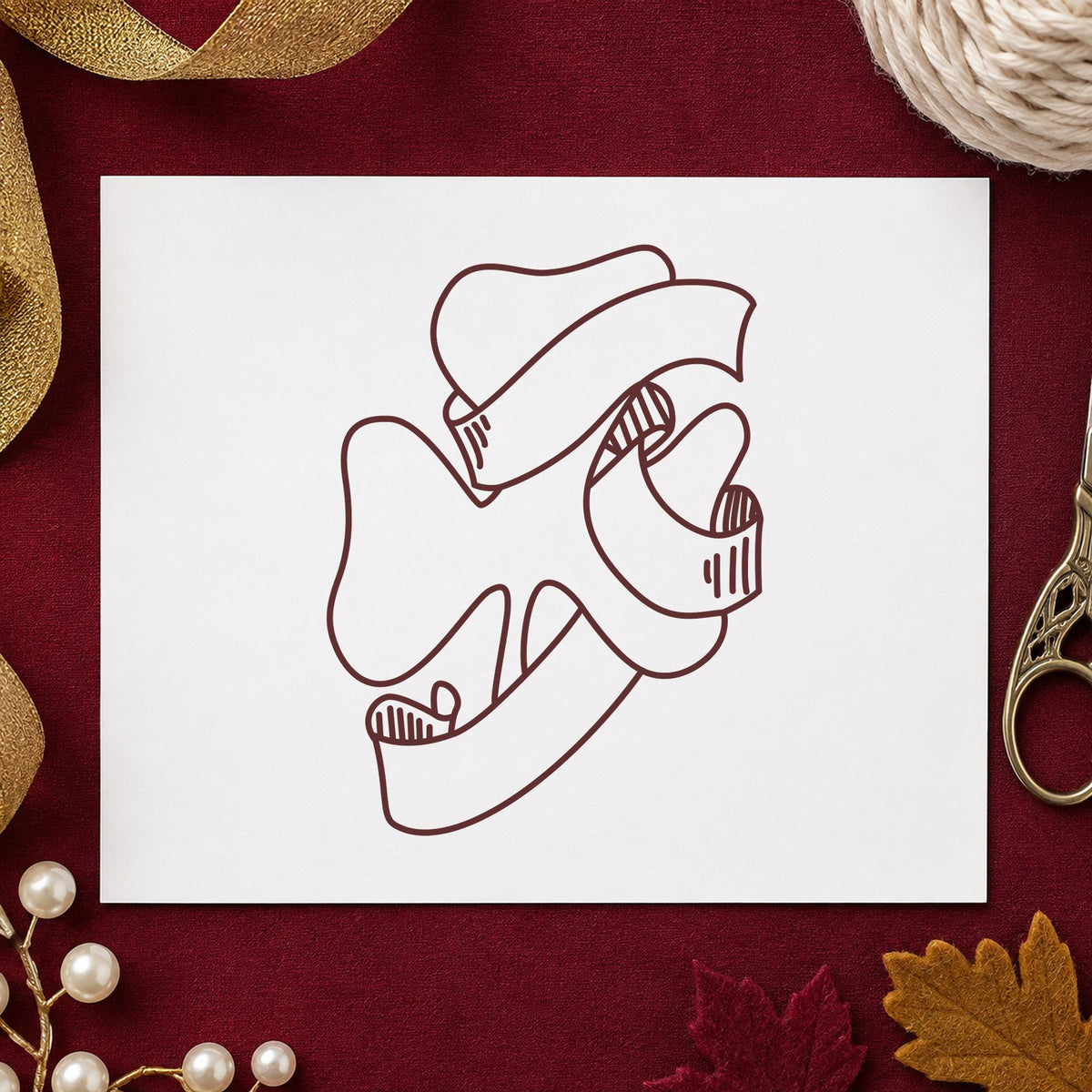 Shamrock with Leprechaun Hat Rubber Stamp impression in brown ink on white paper in a styled craft setting.