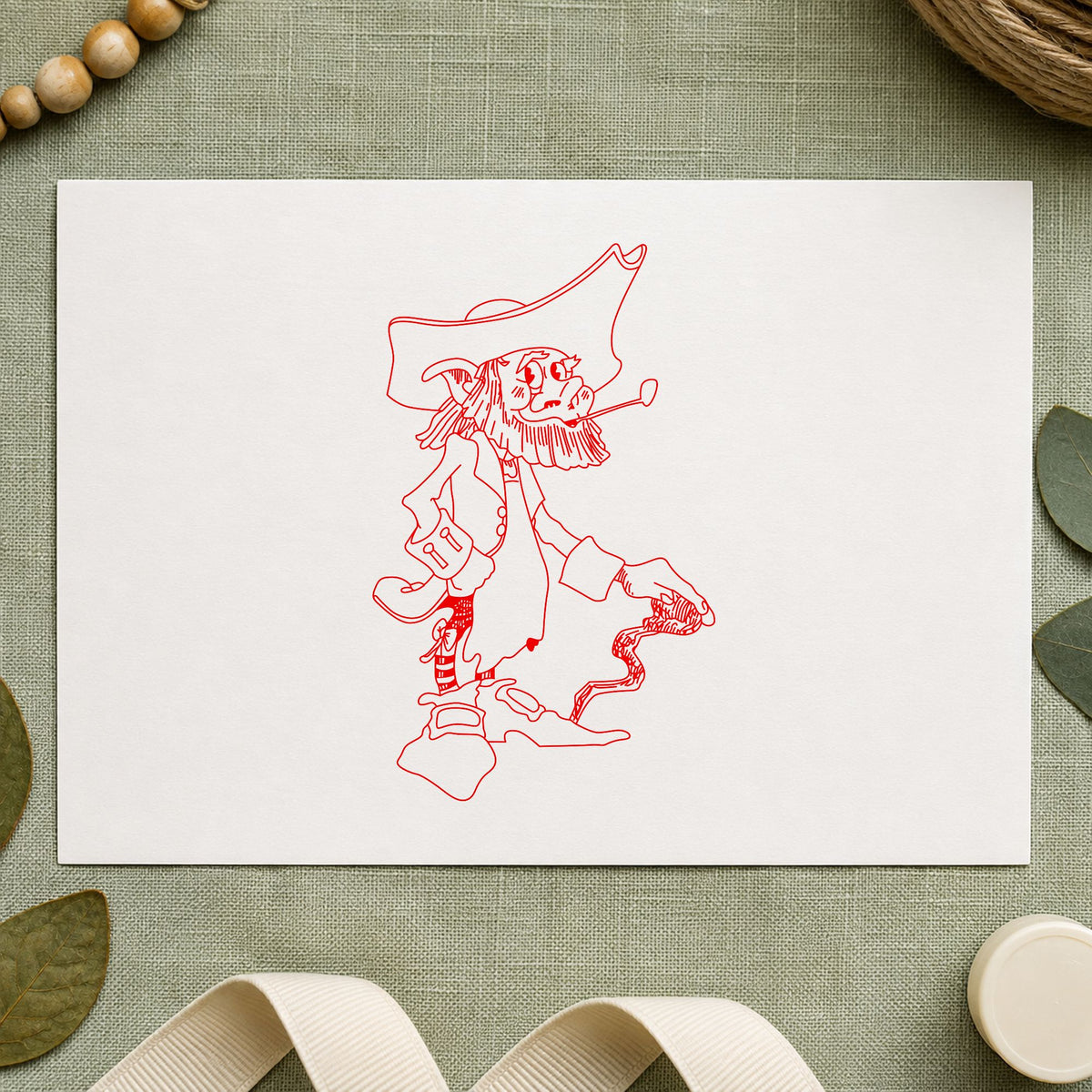 Standing Leprechaun with Cane Rubber Stamp impression in red ink on white paper in a styled craft setting.
