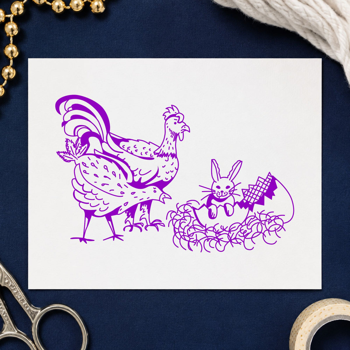 Chickens and Bunny in Easter Egg Rubber Stamp impression in purple ink on white paper in a styled craft setting.