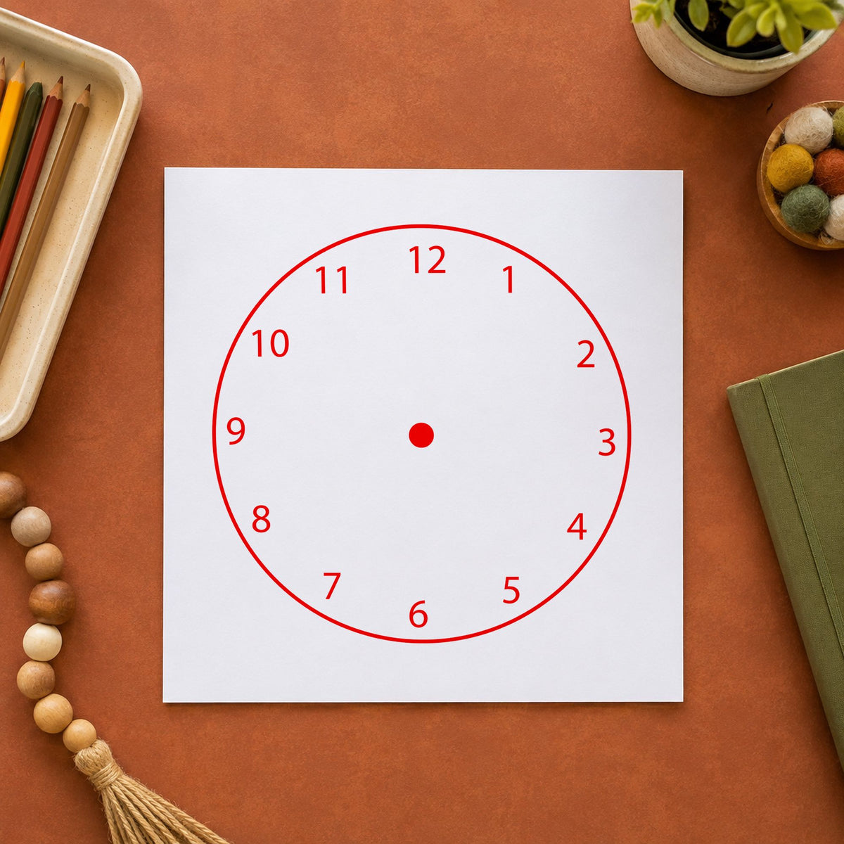 Blank Clock Face Rubber Stamp impression in red ink on white paper in a styled craft setting.
