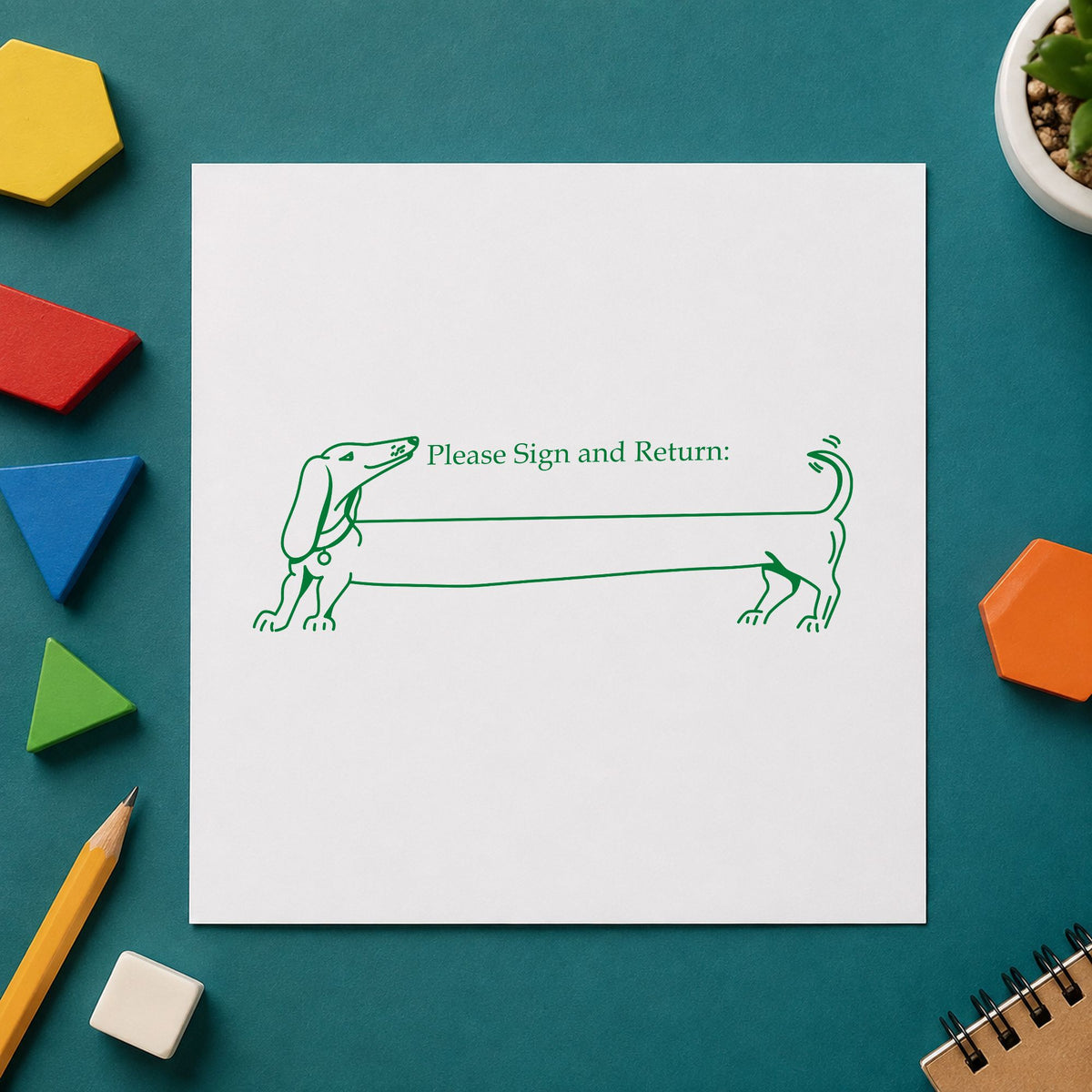 Blank Award Ribbon Rubber Stamp impression in green ink on white paper in a styled craft setting.