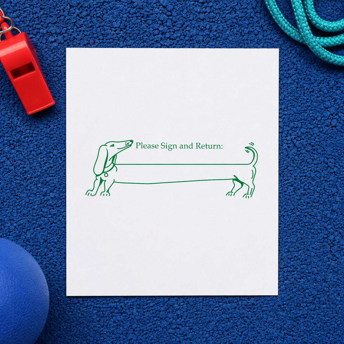 Please Sign and Return Dog Rubber Stamp impression in green ink on white paper in a styled craft setting.