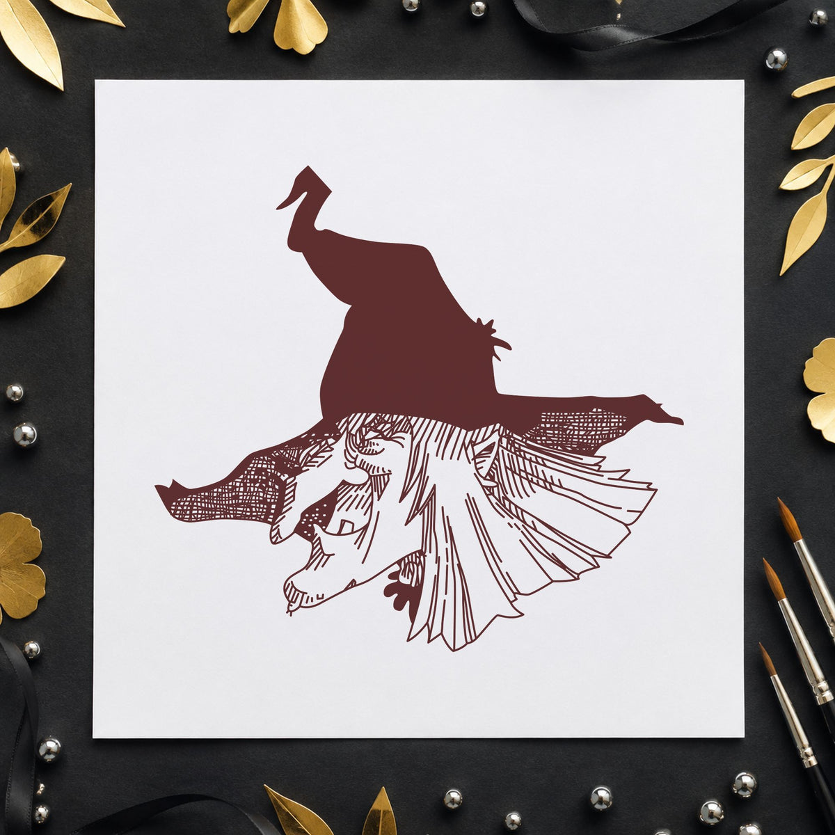 Witch Head with Hat Rubber Stamp impression in brown ink on white paper in a styled craft setting.