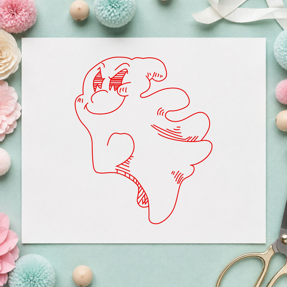 Friendly Smiling Ghost Rubber Stamp impression in red ink on white paper in a styled craft setting.