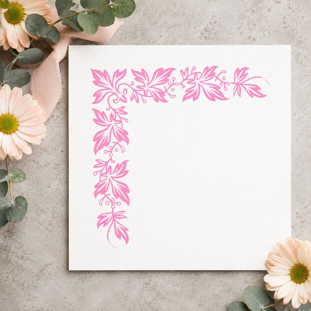 Semi Solid Leaf Corner Rubber Stamp impression in pink ink on white paper in a styled craft setting.