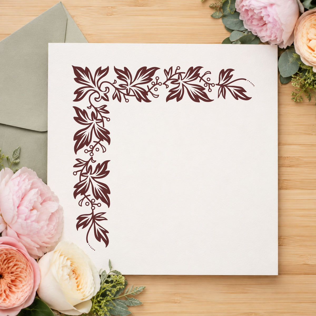 Semi Solid Leaf Corner Rubber Stamp impression in brown ink on white paper in a styled craft setting.