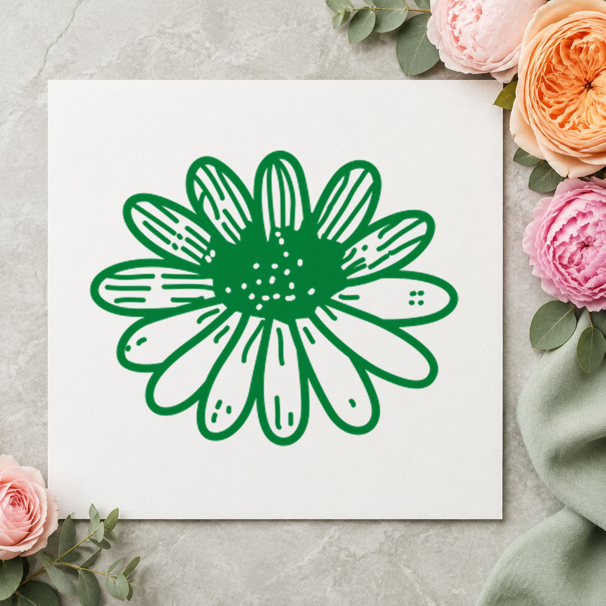 Daisy Flower Rubber Stamp Small impression in green ink on white paper in a styled craft setting.