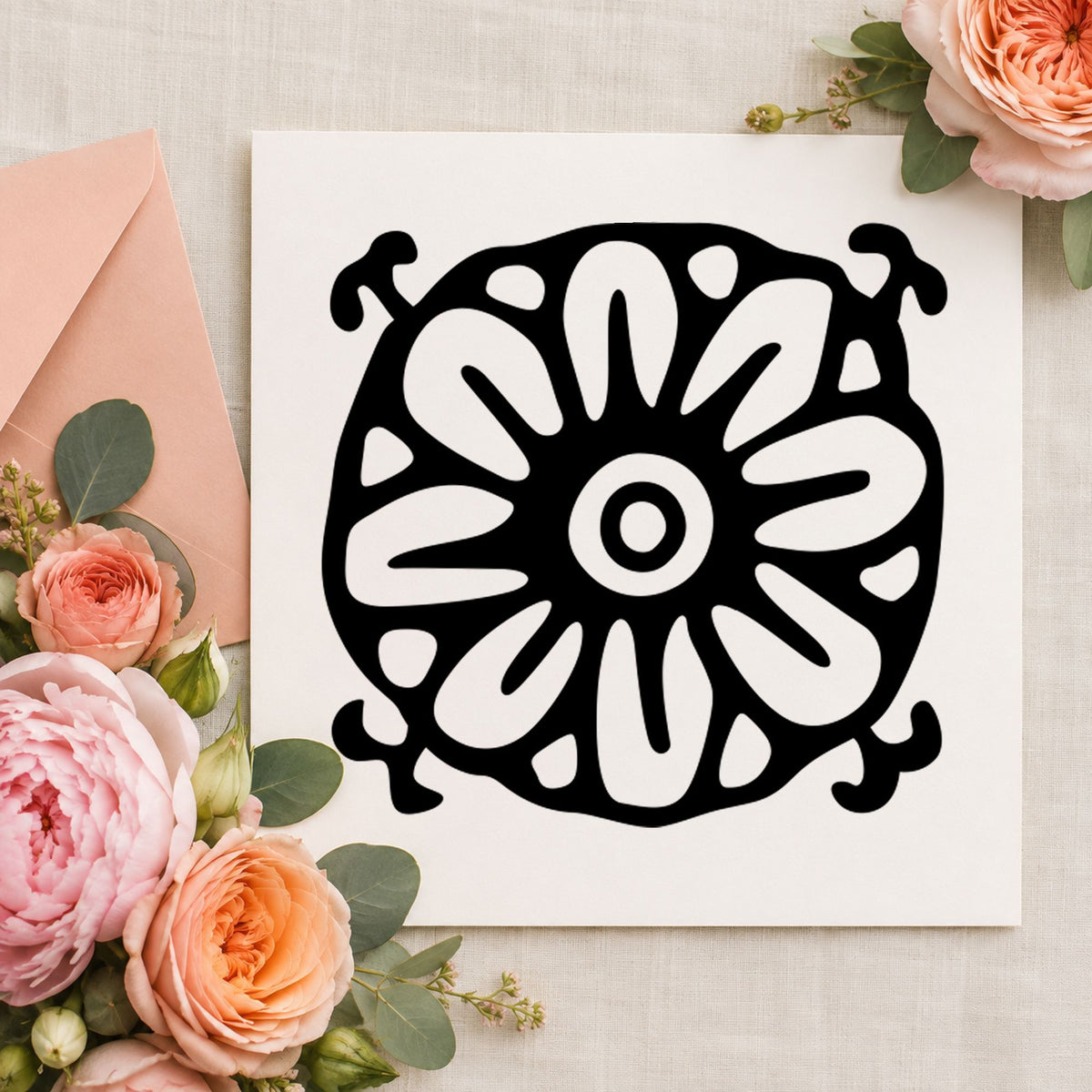 Square Flower Motif Rubber Stamp impression in black ink on white paper in a styled craft setting.