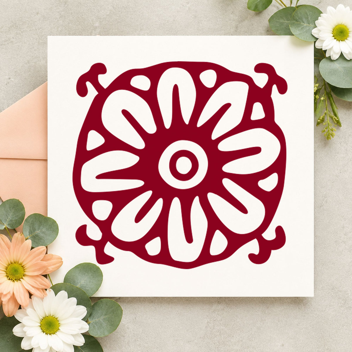 Square Flower Motif Rubber Stamp impression in burgundy ink on white paper in a styled craft setting.