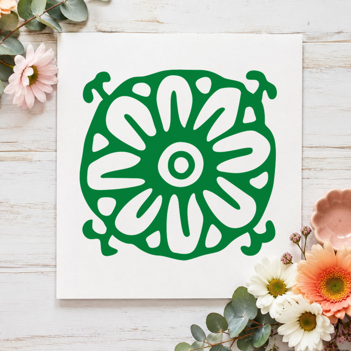 Square Flower Motif Rubber Stamp impression in green ink on white paper in a styled craft setting.